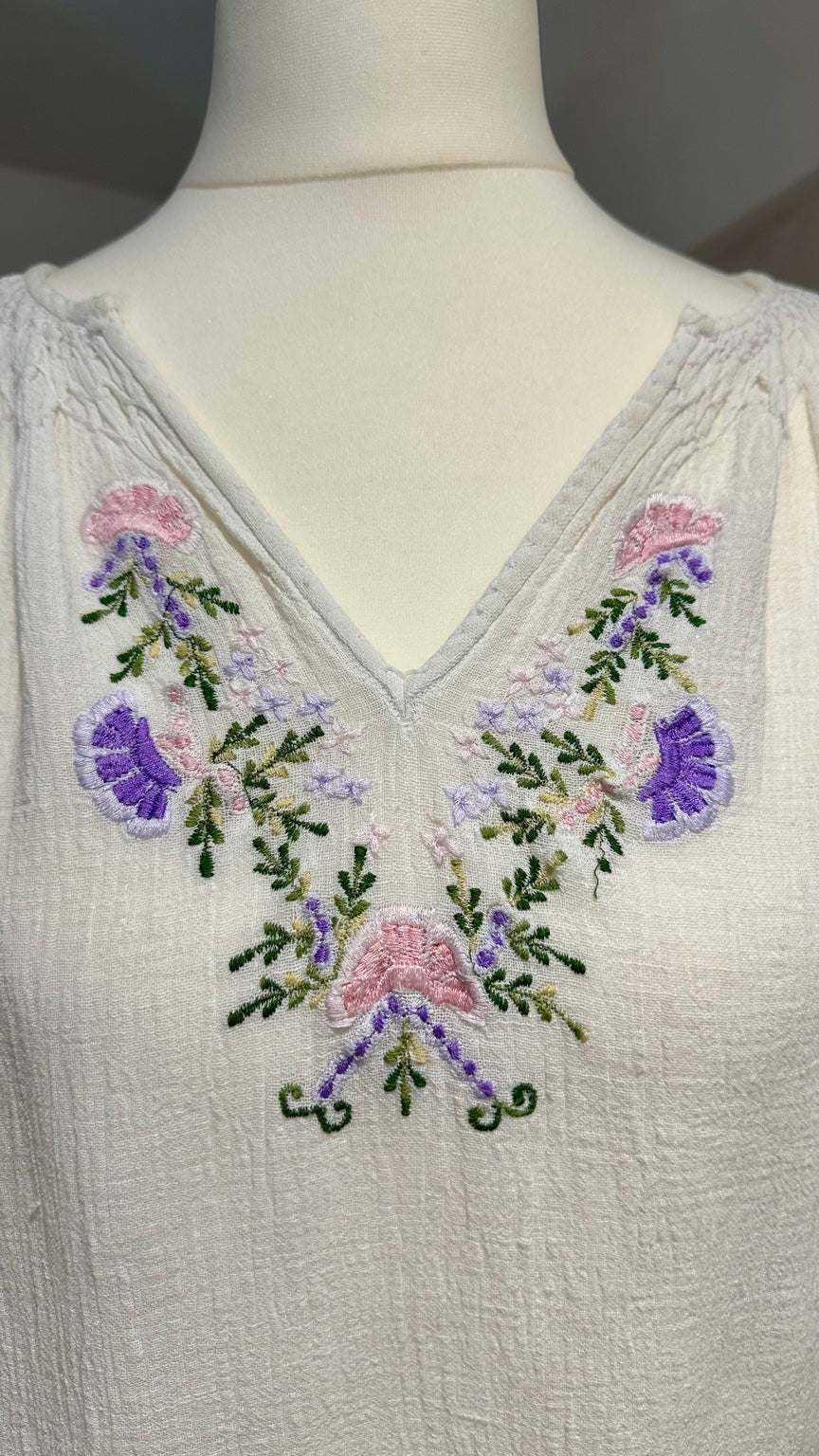 A36 original garment photograph — neckline embroidery detail
