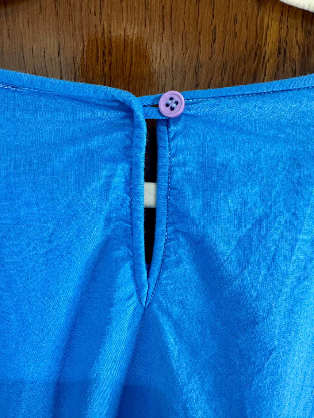 Back neckline fastening