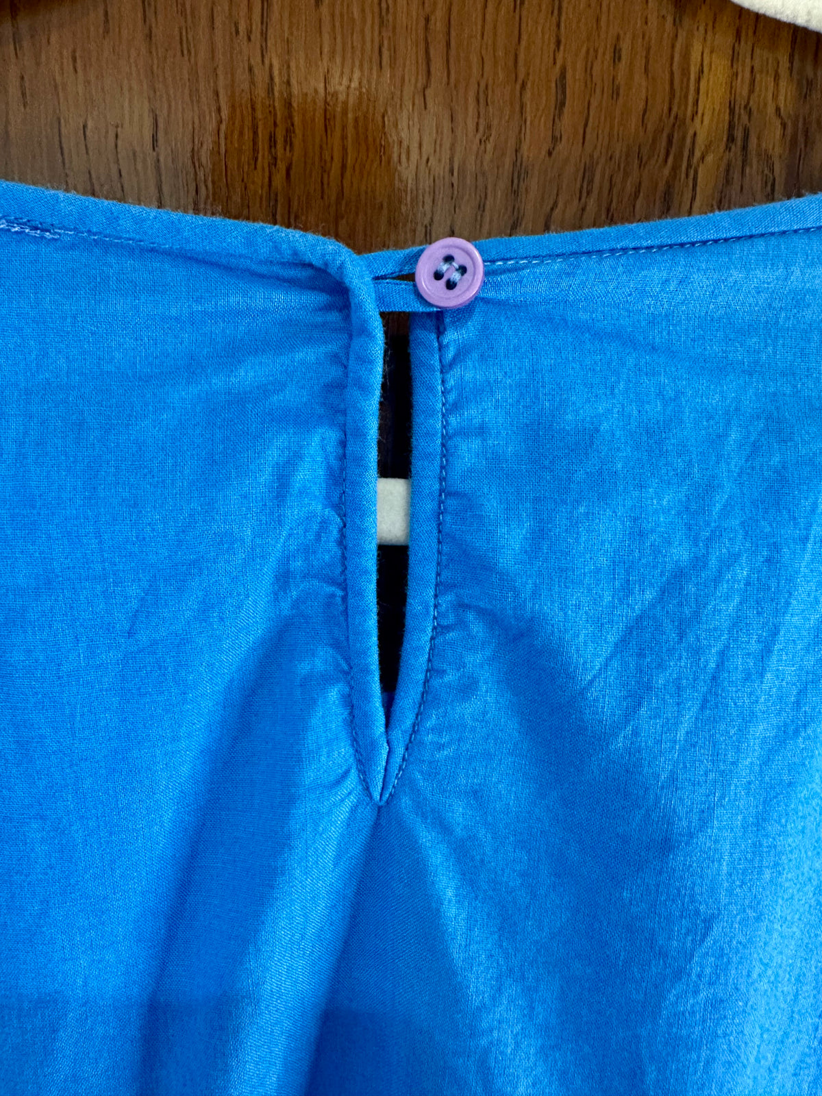 Back neckline fastening