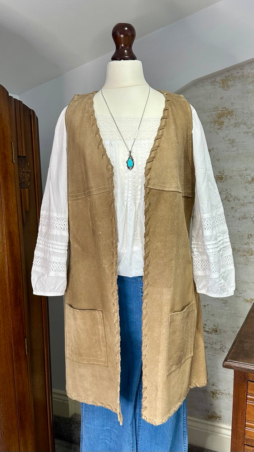A96 tan suede waistcoat — styled front view on mannequin