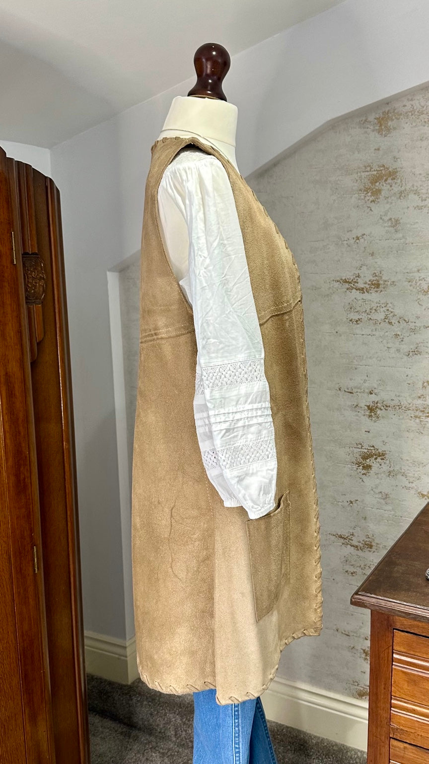 A96 tan suede waistcoat — side view on mannequin