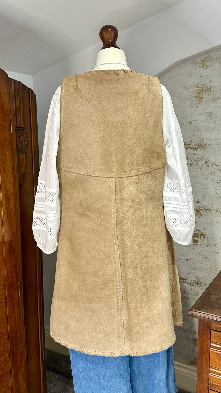 A96 tan suede waistcoat — back view on mannequin