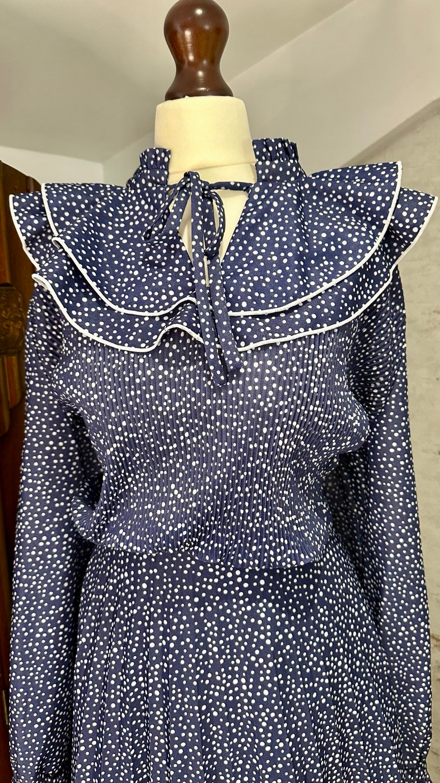 Layered ruffle collar and pleated bodice
