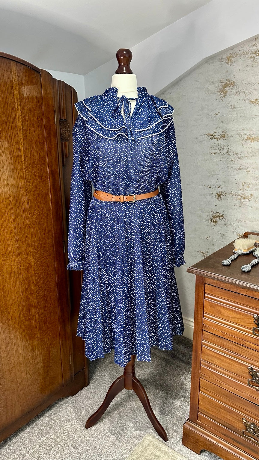Styled with belt, not included