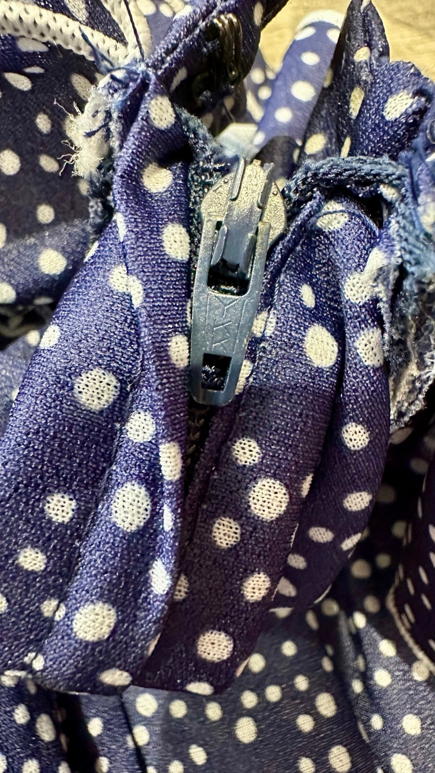 Back zip and fraying at top of zip opening