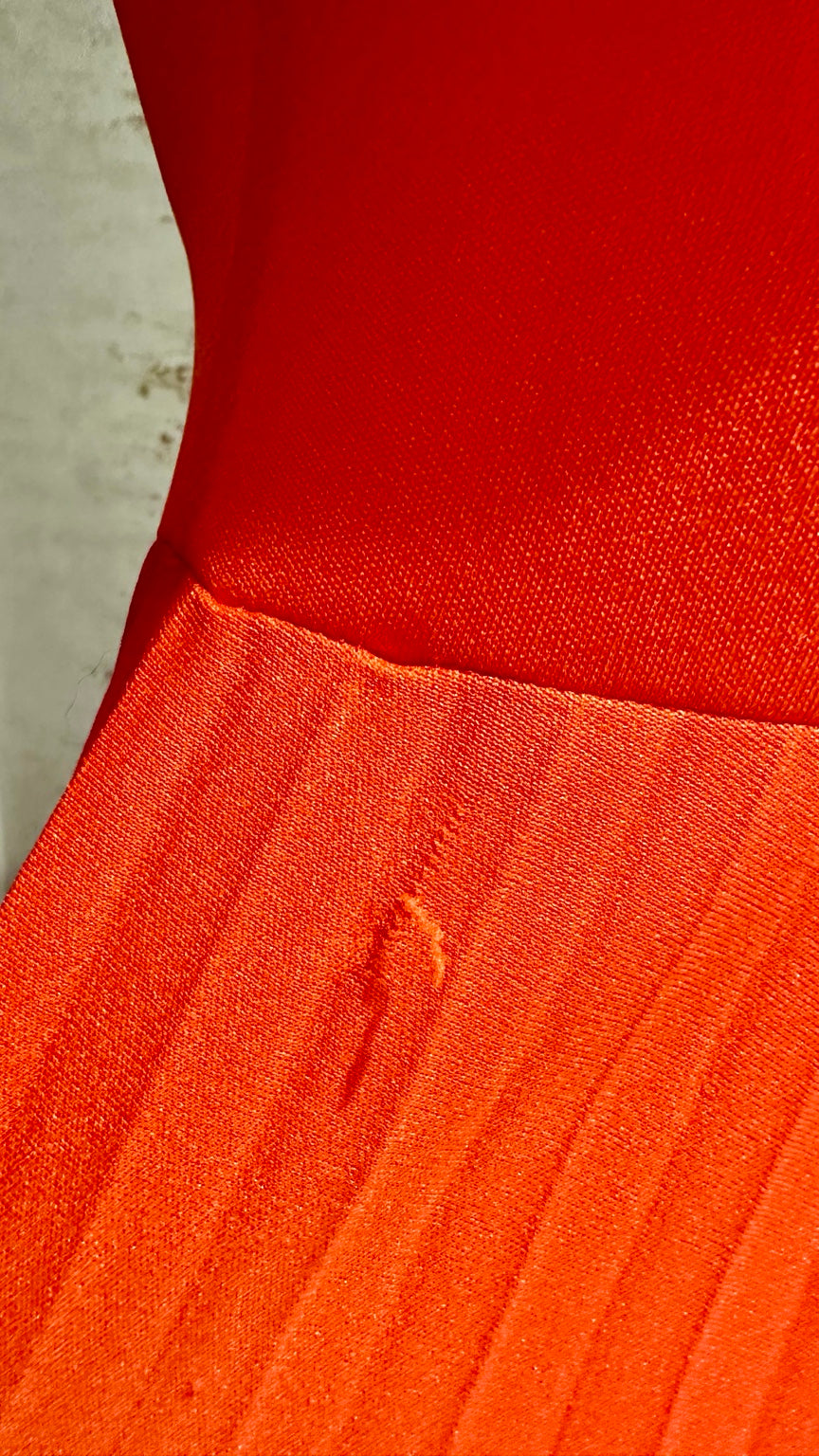 B31 original garment photograph — visible skirt fabric flaw