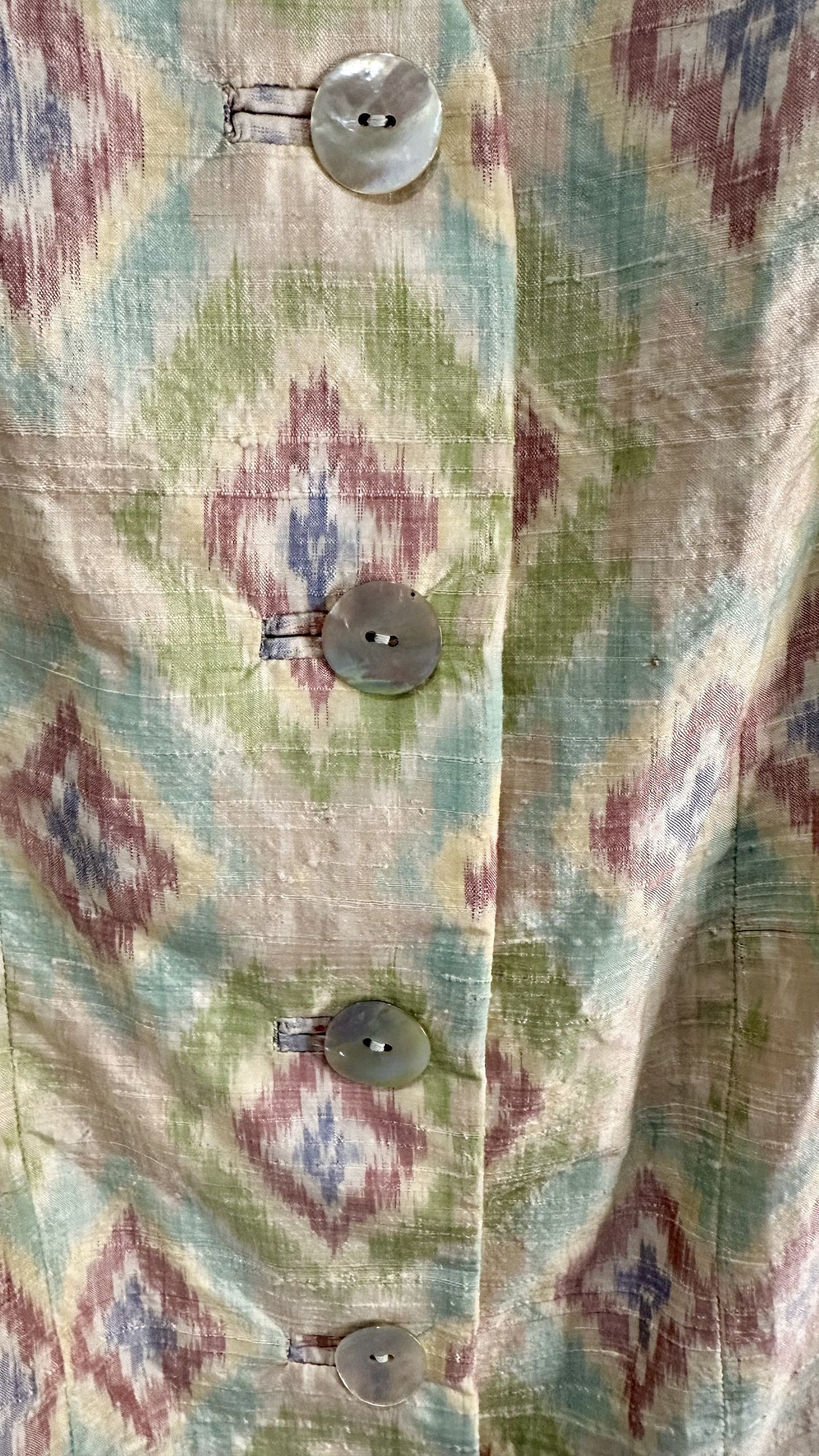 B51 textured fabric close-up showing existing pulls, snags and loose threads — 4646