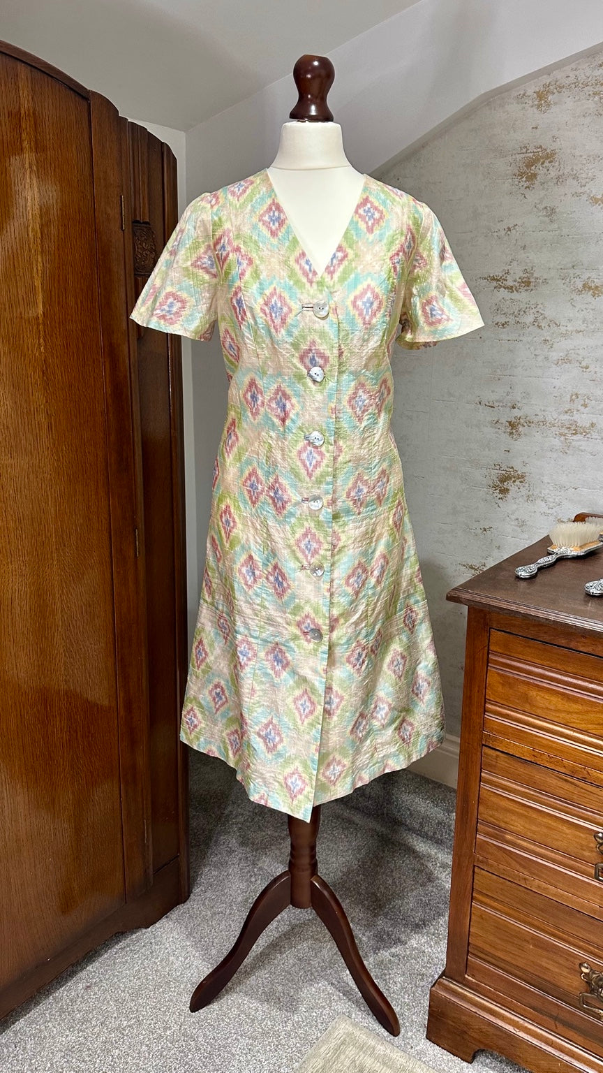 B51 vintage pastel ikat-style button-front dress — front on mannequin