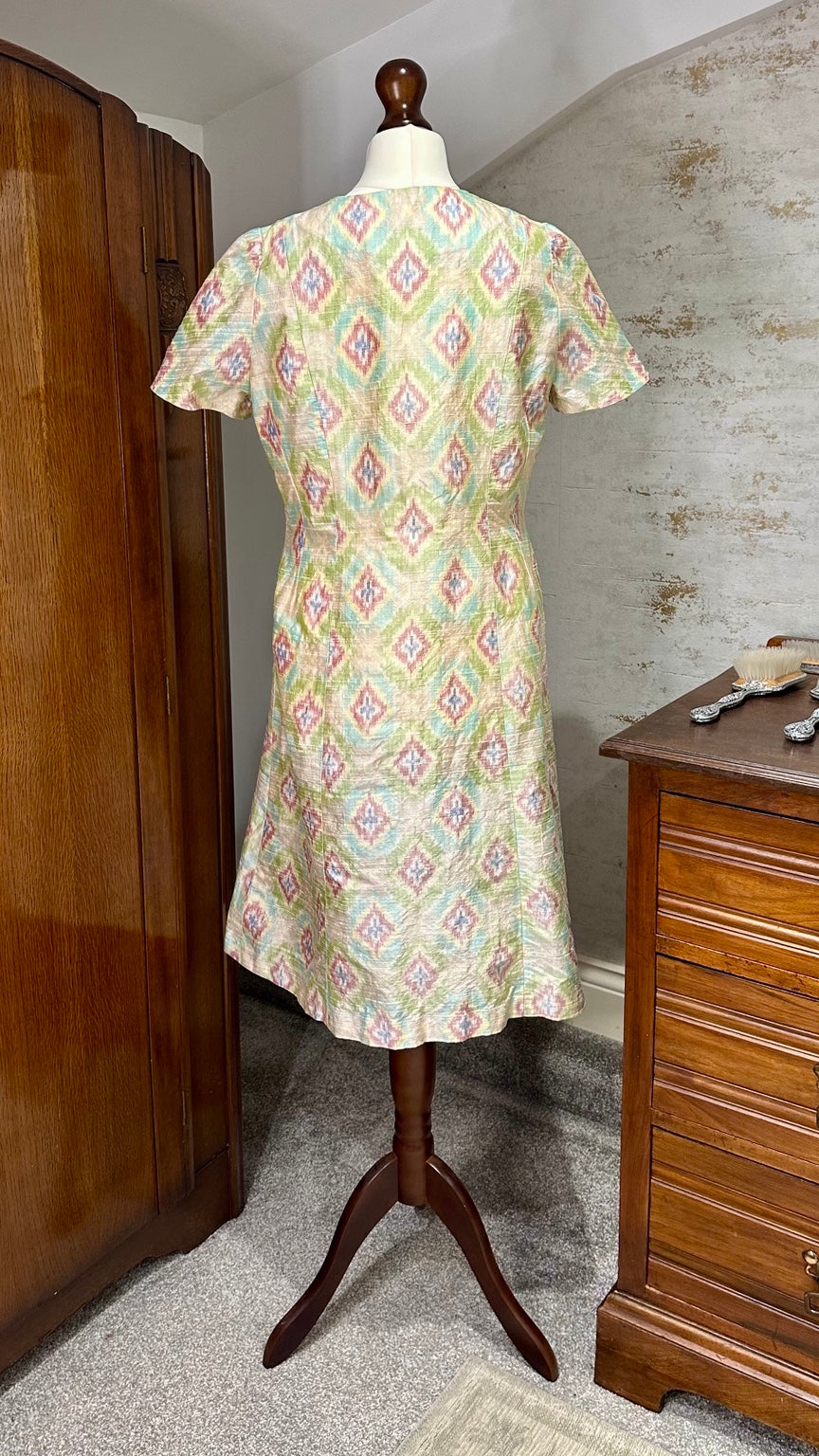 B51 vintage pastel ikat-style button-front dress — back on mannequin