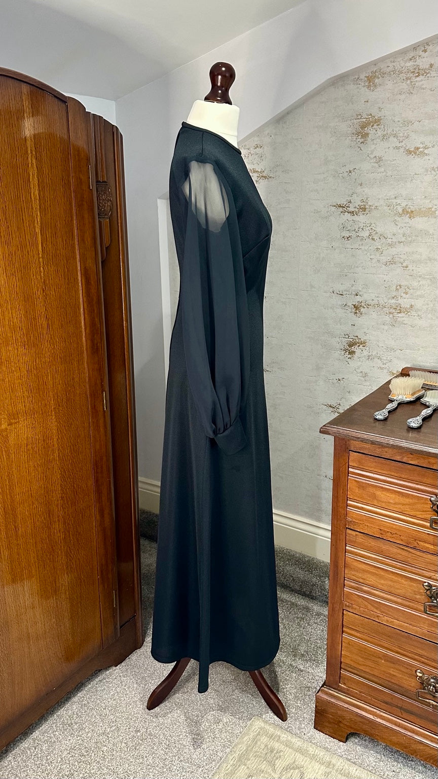 B56 black maxi dress — side view showing silhouette