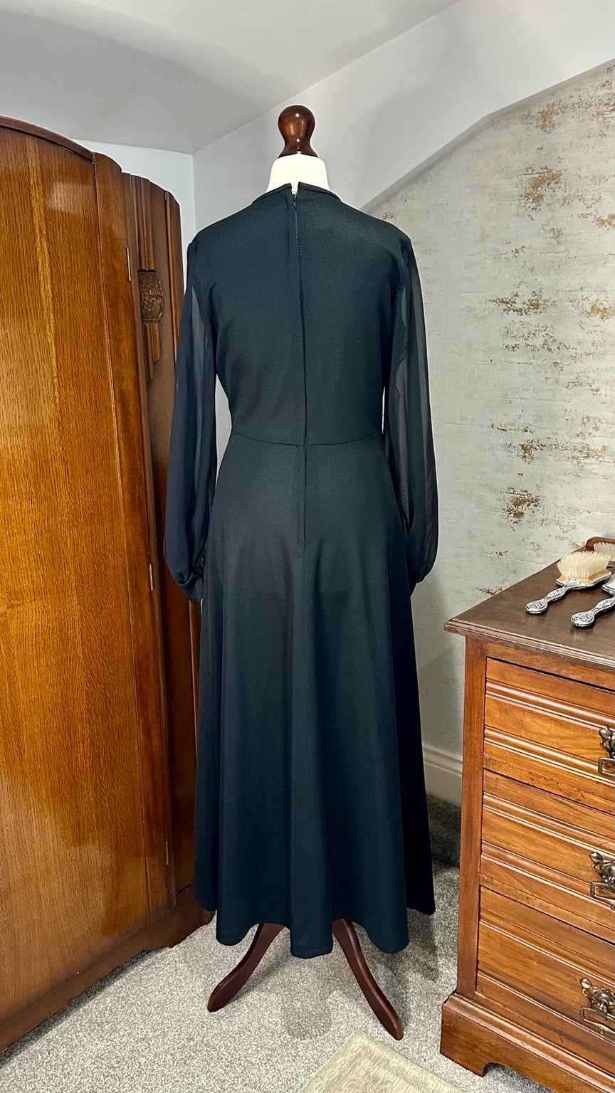 B56 black maxi dress — back view on mannequin
