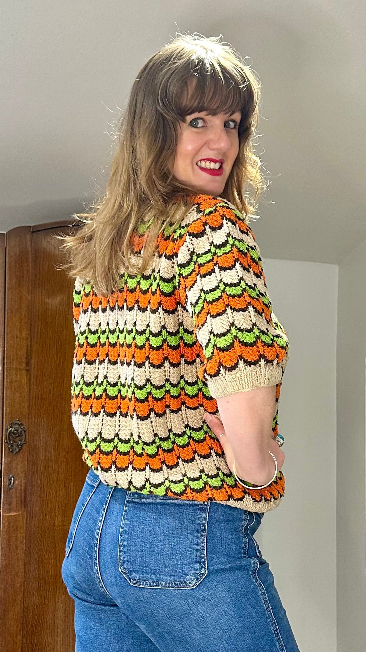 Hand-Knitted Orange and Green Ripple Cardigan — photograph 2